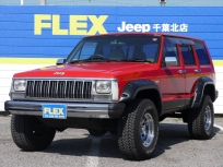 チェロキースポーツ Ｊｅｅｐチェロキースポーツ　【リフトＵＰ＆背面レス仕様】【ブッシュワーカーオーバーフェンダー】【クロームパーツ】