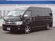 ハイエース200 TRH229W 【特設カラーのブラック】新車!グランドキャビン4WD!寒冷地仕様!3ナンバー 10人乗り!DNA18インチアルミ!1.5インチローダウン!黒木目インテリア!注目の1台!
