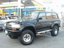 トヨタ ランドクルーザー80VX-LTD 【ブラックニューペイント】【５インチアップ】【背面レス】【ＵＳコーナー】【クリスタルオレンジウィンカー】